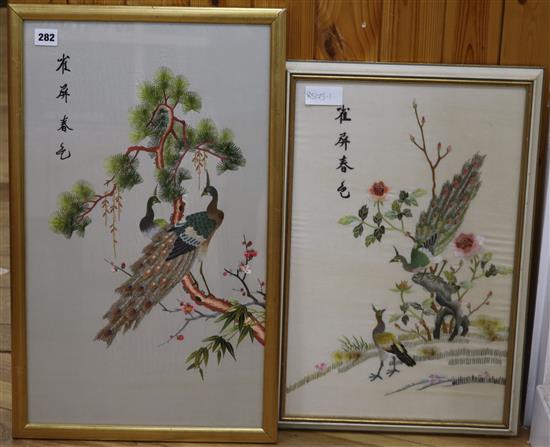 Four Chinese framed embroideries and a feather picture